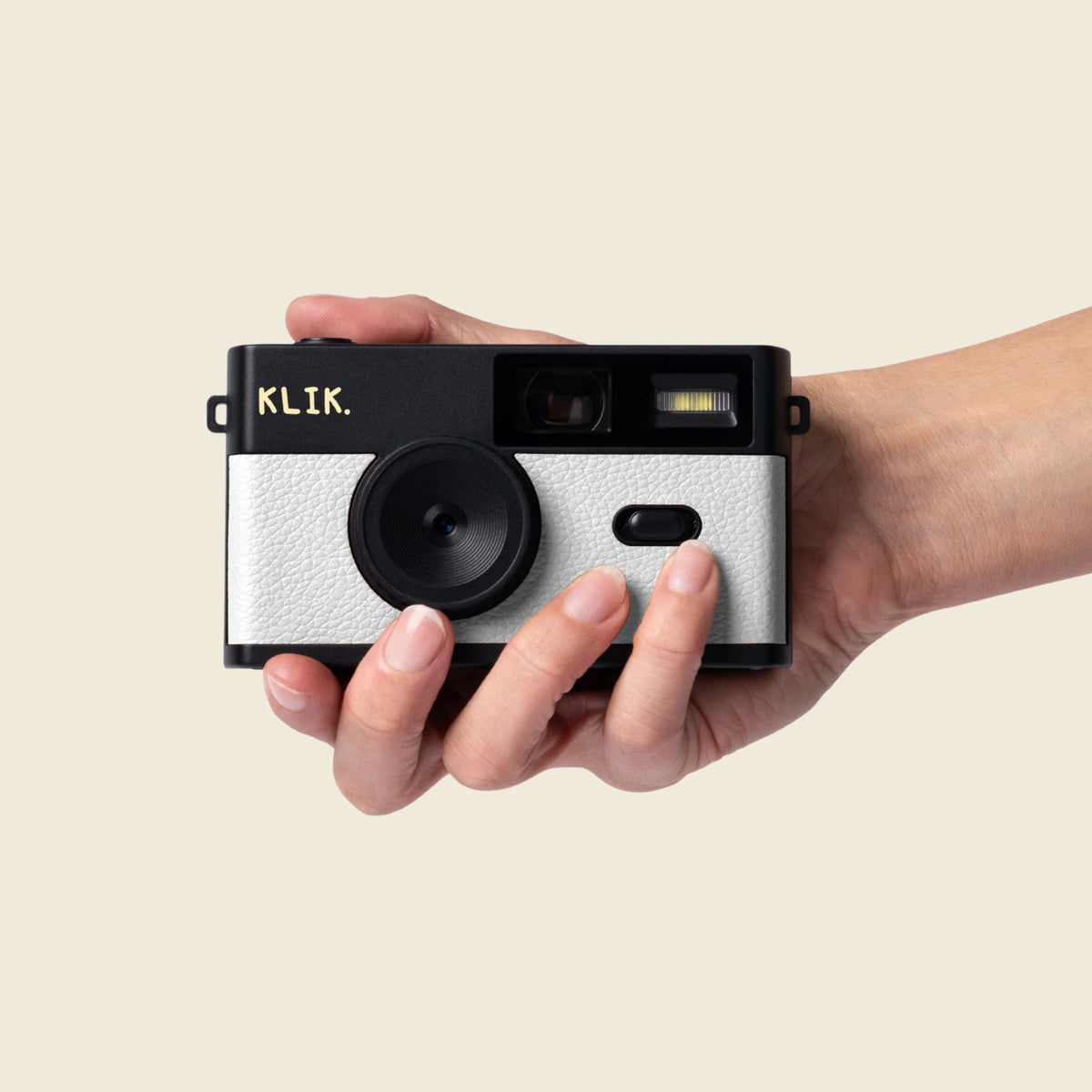 Blanc – Appareil photo en main
